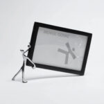 MOVERS AND SHAKERS – Stylish Metal Photoframe For Desktops